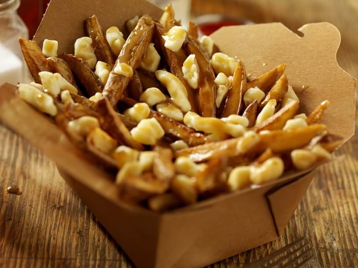 McNally Travel |Give Poutine a try when visiting Canada
